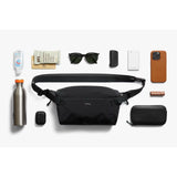 Bellroy Lite Sling bag showing adjustable strap, compact design, and sleek black fabric for everyday carry and organization.
