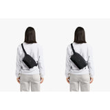 Bellroy Lite Sling bag showing compact design with adjustable strap and sleek black fabric for everyday carry.