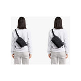 Bellroy Lite Sling Mini in compact black sling bag with adjustable strap and sleek design, perfect for everyday essentials.