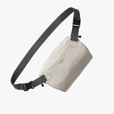 Bellroy Lite Sling Mini in black, compact sling bag with adjustable strap and multiple compartments for everyday organization