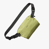 Bellroy Lite Sling Mini in black showing compact design, adjustable strap, and multiple compartments for everyday essentials.