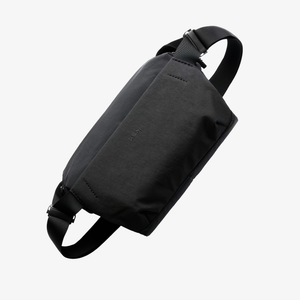 Bellroy Venture Sling 9L in black, compact sling bag with adjustable strap and multiple compartments for organized carrying.