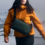 Bellroy Venture Sling 9L in black with multiple pockets and adjustable strap, designed for compact, organized carrying.
