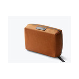 Bellroy Tech Kit Compact in black with organized compartments for electronic accessories and cables.