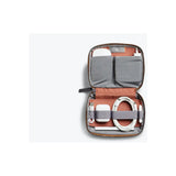 Bellroy Tech Kit Compact in black, compact travel organizer with multiple compartments for tech accessories.