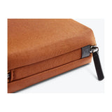 Bellroy Tech Kit Compact in black, a sleek organizer pouch with multiple compartments for cables and accessories.
