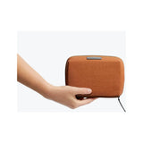 Bellroy Tech Kit Compact in black, showing its sleek design and organized interior for tech accessories.