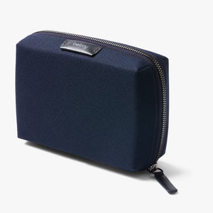 Bellroy Tech Kit Compact showing organized interior with multiple compartments for cables and accessories.