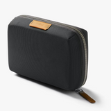 Black Bellroy Tech Kit Compact with organized compartments for cables and accessories, compact and stylish tech storage solution.