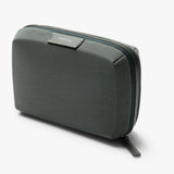 Bellroy Tech Kit Compact in black, compact organizer with multiple compartments for cables, chargers, and tech accessories.