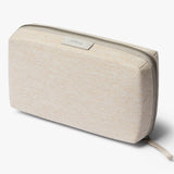 Bellroy Tech Kit with multiple compartments for organizing cables, chargers, and accessories in a sleek, compact design.