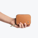 Bellroy Folio Mini in toffee color, featuring compact wallet design with card slots and cash pocket, made from premium leather.