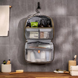 Bellroy Hanging Toiletry Kit Plus in stone, a versatile travel bag with compartments for organizing toiletries and personal items.