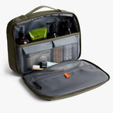 Bellroy Hanging Toiletry Kit Plus in stone, a compact toiletry bag with hanging hook and multiple compartments for travel organization.