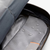 Bellroy toiletry kit in clay color with multiple compartments, compact design, and durable material for travel organization.