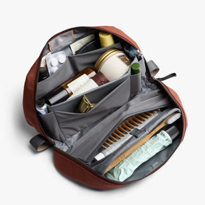 Bellroy Toiletry Kit Plus in clay color, a compact travel toiletry bag with multiple compartments and durable fabric.