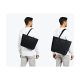 Bellroy Tokyo Tote bag in black fabric with top handles, showing its sleek, minimalist design and spacious interior.