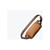 Bellroy Venture Ready Sling 2.5L waist pack showing compact black design with adjustable strap and multiple storage compartments