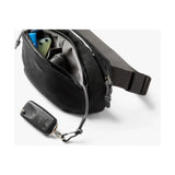 Bellroy Venture Hip Pack 1.5L waist pack with black fabric, adjustable strap, and compact storage for travel and daily use.