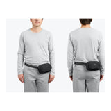 Bellroy Venture Hip Pack 1.5L waist pack showing black nylon material with zipper closure and adjustable strap.