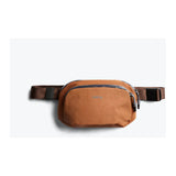 Bellroy Venture Hip Pack 1.5L waist pack with multiple compartments, black nylon material, adjustable strap, and sleek design.