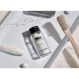 Bite Floss in a white container with blue accents, designed for effective dental cleaning and interdental flossing.