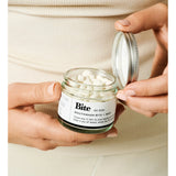 Bite Mint Mouthwash Bits in a transparent container, showing small, round mint-flavored oral rinse tablets for fresh breath and oral hygiene.