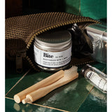 Bite Mint Mouthwash Bits in a transparent container showing small mint-flavored mouthwash tablets for fresh breath.