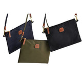 Bric's Sportina Large travel tote bag in blue, black, and olive with durable design and ample storage for travel essentials.