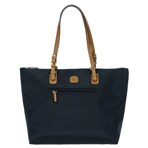 Bric's X-Collection Sportina Large travel suitcase with durable fabric and sleek design, shown with open zipper and spacious interior.