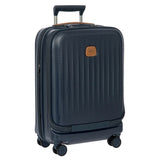 Bric's Taormina 21-inch expandable spinner carry-on luggage with pocket, black hard-shell exterior and four spinner wheels.
