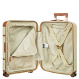 Bric's Bellagio 3.0 21-inch spinner carry-on luggage with hard shell in black, four spinner wheels, and retractable handle.