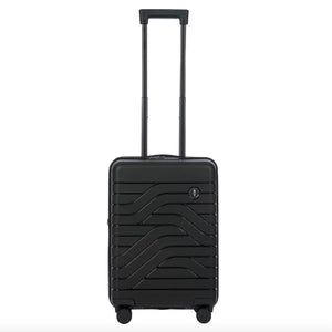 Bric's B|Y Ulisse 21-inch expandable spinner luggage with four wheels and sleek design, suitable for travel and storage.