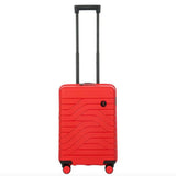 Bric's B|Y Ulisse 21-inch expandable spinner luggage with hard shell and four wheels, black color, ready for travel.