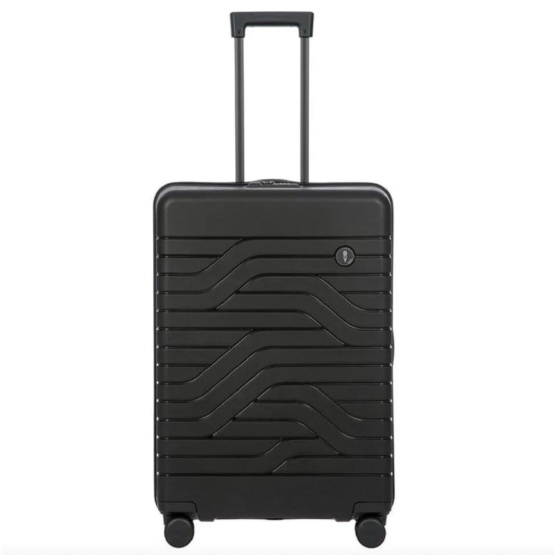 Bric's B|Y Ulisse 27.5-inch expandable spinner luggage with hard shell and four wheels for easy travel.