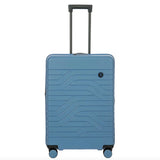 Bric's B|Y Ulisse 27.5-inch expandable spinner luggage with hard shell, four wheels, and telescopic handle for travel.