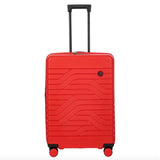 Bric's B|Y Ulisse 27.5-inch expandable spinner luggage with hard shell and telescopic handle, standing upright on a flat surface.