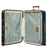 Bric's Bellagio 3.0 30-inch expandable spinner luggage with four wheels and a hard shell in beige.