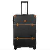 Bric's Bellagio 3.0 30-inch expandable spinner luggage with four wheels and retractable handle, shown in a close-up view.
