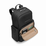 Navy Briggs & Riley Rhapsody medium backpack with multiple compartments and padded straps for everyday use.