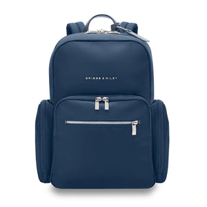 Navy Briggs & Riley Rhapsody medium backpack with multiple compartments and padded straps for comfortable carrying.