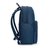 Navy Briggs & Riley Rhapsody medium backpack with padded shoulder straps and multiple compartments for travel and daily use.