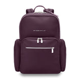 Navy Briggs & Riley Rhapsody medium backpack showing multiple compartments and padded shoulder straps for comfortable carrying.