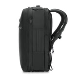 Briggs & Riley Baseline Medium Convertible Backpack shown from the side, highlighting its sleek design and multiple compartments.