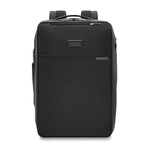 Briggs & Riley Baseline medium convertible backpack with front zipper pocket, adjustable straps, and sleek black design.