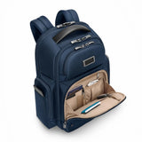 Black Briggs & Riley @work medium cargo backpack with multiple compartments and padded shoulder straps for comfortable carrying.