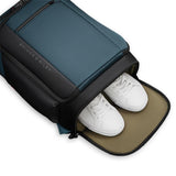 Black Briggs & Riley ZDX U-Zip travel backpack with multiple compartments and padded shoulder straps for comfortable carrying.