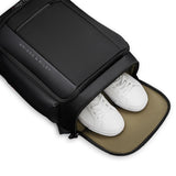 Black Briggs & Riley ZDX U-Zip Travel Backpack with multiple compartments and padded straps for comfortable travel.