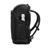 Black Briggs & Riley ZDX U-Zip travel backpack with multiple compartments and padded shoulder straps for comfortable carrying.