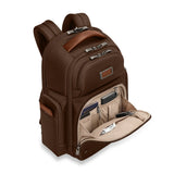 Interior view of Briggs & Riley @work Large Cargo Backpack in limited edition chocolate, showing compartments and organizational features.